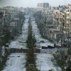 O depoimento assustador de uma brasileira que fugiu da guerra civil síria A general view shows a damaged street with sandbags used as barriers in Aleppo's Saif al-Dawla district